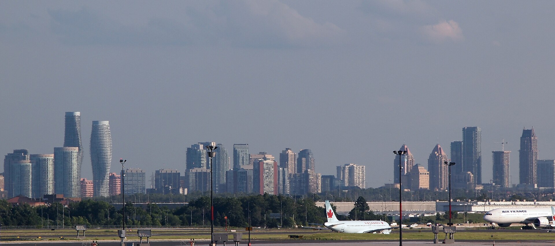 Mississauga (YYZ) — balikbayan return airport from USA, Canada, Australia, photo via Wikimedia Commons (media-list scan)